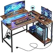 Bestier Small L Shaped Desk with Charging Port & LED Strip,Modern Computer Desk with Reversible Storage Shelves,Corner Desk with Hooks for Bedroom Office Studio Workstation,Rustic Brown