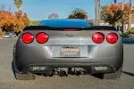 Replacement for 2005-2013 Chevrolet Corvette C6 All Models | ZR1 Extended Style Rear Trunk Lid Wing Spoiler (ABS Plastic - Glossy Black)