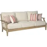 Signature Design by Ashley Clare View Sofa with Beige Cushion in Antique Teak